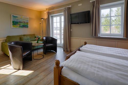 Katil atau katil-katil dalam bilik di Meeressterne Hotel Forsthaus Damerow