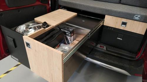 an open drawer in the back of a truck at Dacia Dokker Camperiz in Palma de Mallorca