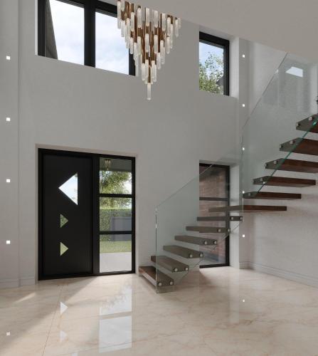 a staircase in a house with a chandelier at Luxurious New Build in Nottingham