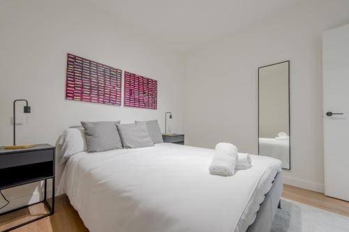 Katil atau katil-katil dalam bilik di Cozy APT para 6pax a escasos metros del Retiro - Madrid