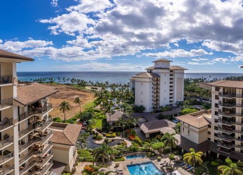 an aerial view of the resort buildings and the ocean at Ko Olina Beach Villas B403 in Kapolei