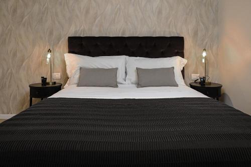 Llit o llits en una habitació de Classbnb - Bilocale di design in zona Sempione