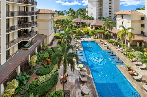 an aerial view of a resort with a swimming pool at Ko Olina Beach Villas O704 in Kapolei