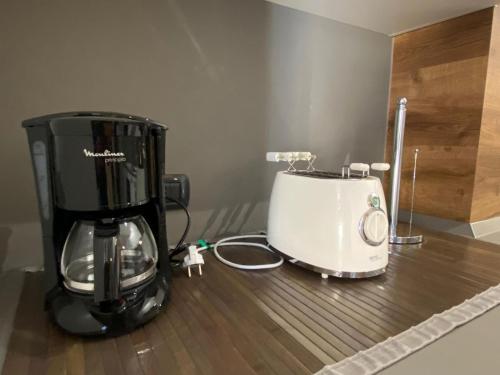 a coffee maker sitting on top of a counter at Lakeside Apartment in Gravedona