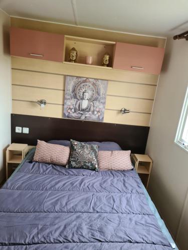 Ένα ή περισσότερα κρεβάτια σε δωμάτιο στο Mobil-home 5 places