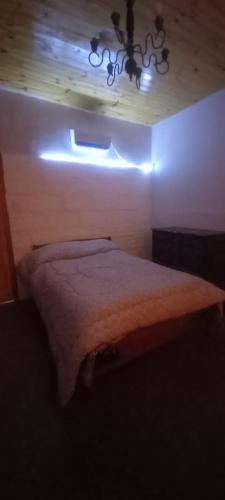 Ένα ή περισσότερα κρεβάτια σε δωμάτιο στο Hostel Paraíso