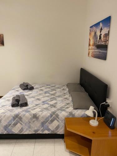 Katil atau katil-katil dalam bilik di Casa Cavaleri Sweet apartment MM Bande Nere