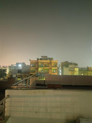 a view of a city from the roof of a building at Madhuri Guest House in Varanasi