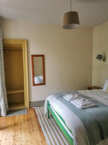 Ένα ή περισσότερα κρεβάτια σε δωμάτιο στο Jameswood Villa
