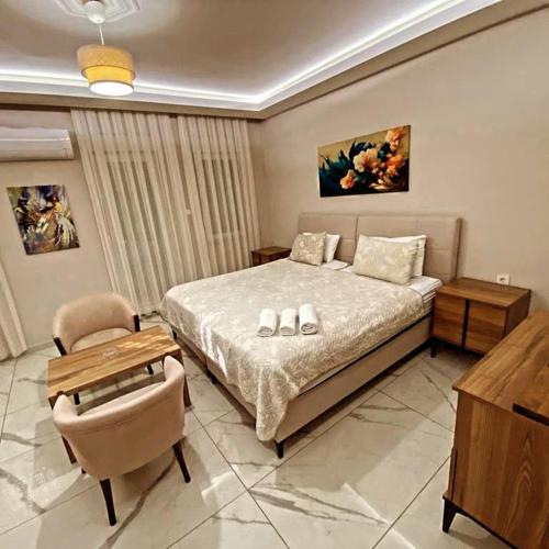 Säng eller sängar i ett rum på Hasanbey Apart Otel