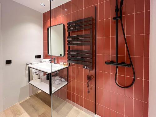 a bathroom with a sink and a mirror at Stay U-nique Apartment Putxet in Barcelona