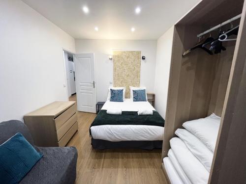 Postel nebo postele na pokoji v ubytování 17 - Pretty Flat in Paris Montorgueil 2