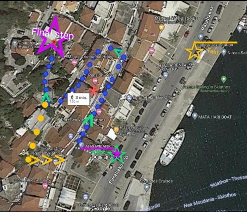 a map of a parking lot with purple dots at Final step in Skiathos Town
