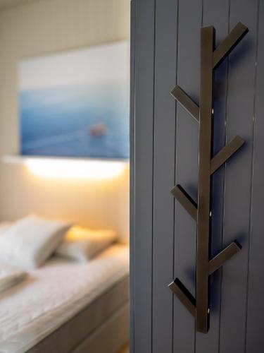 a bedroom door with a bed in the background at Viste Funäsdalen in Funäsdalen