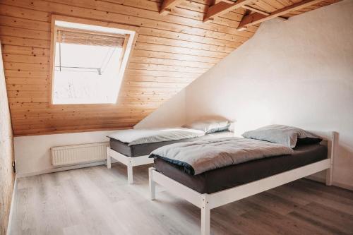 Ένα ή περισσότερα κρεβάτια σε δωμάτιο στο Wohnung am Bodensee