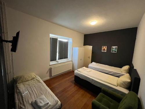 A bed or beds in a room at 3-SZ Monteurswohnung mit 2 Bädern mit guter Anbindung