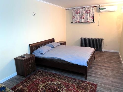 Llit o llits en una habitació de Star Apartment