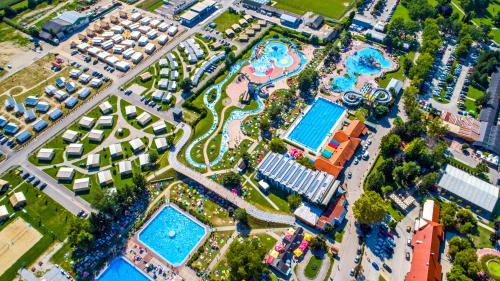 an aerial view of a resort with a pool at Glamping Terme Čatež in Brežice