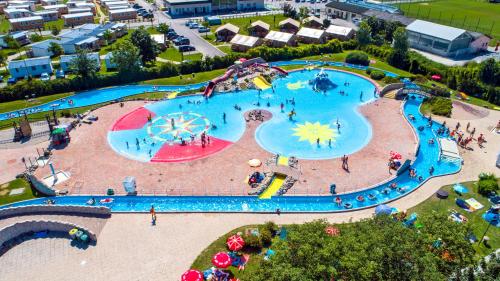 an aerial view of a large water park at Glamping Terme Čatež in Brežice