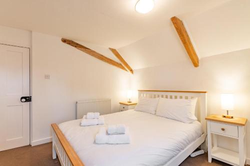 Katil atau katil-katil dalam bilik di 1 Ruscon Cottage