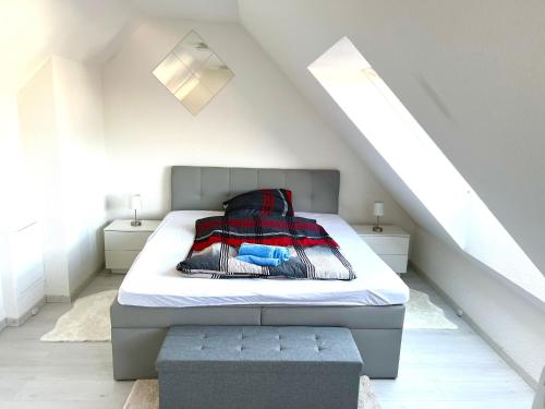 Ένα ή περισσότερα κρεβάτια σε δωμάτιο στο Luxus Maisonette Wohnung, Apartment am See, Wehome Komfort