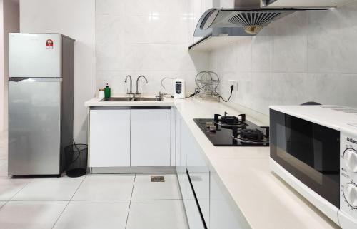 Una cocina o cocineta en Mono Suite I Kuching DeLofts I 9 Pax