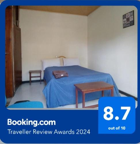Una cama o camas en una habitación de Wib Guesthouse