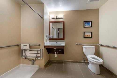 a bathroom with a toilet and a sink at Comfort Inn & Suites in Goodland