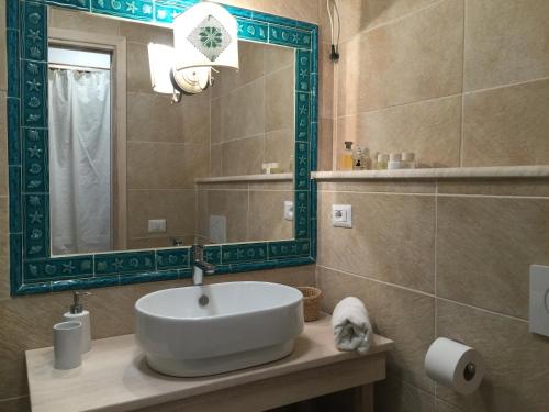 Ванна кімната в Smeralda Residenza Di Charme