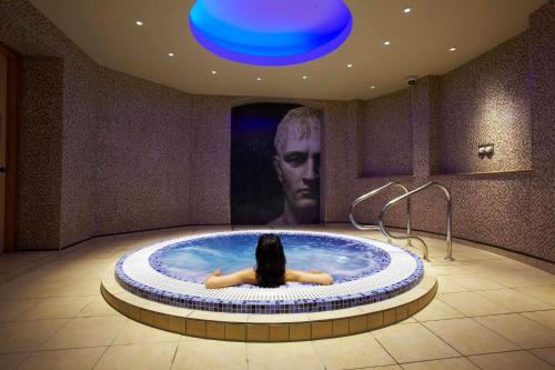 a statue of a man in a bath tub at The Grand, York in York