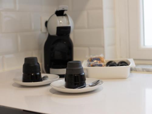 Coffee and tea making facilities at Alojamiento Turistico Zamora 58