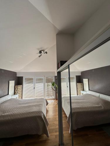 Ένα ή περισσότερα κρεβάτια σε δωμάτιο στο Apartman Queen of Opatija