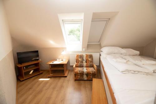 Cama o camas de una habitación en Hotel Allvet