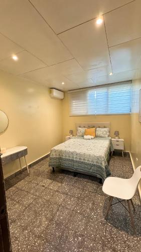 En eller flere senge i et værelse på Lindo espacio, cómodo y céntrico