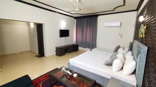 Μια τηλεόραση ή/και κέντρο ψυχαγωγίας στο Aleph Islamabad Guest House
