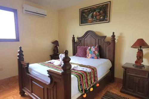 Una cama o camas en una habitación de Casa Guadalupe