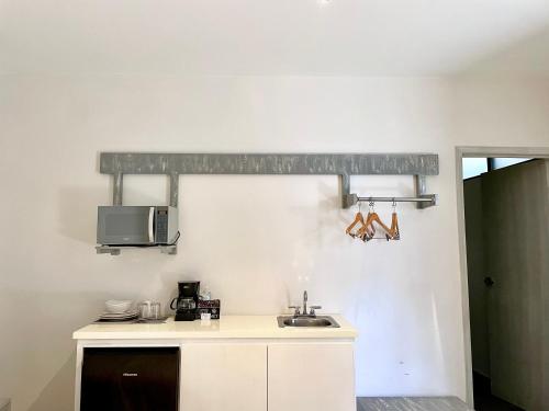Η κουζίνα ή μικρή κουζίνα στο Capital Suites