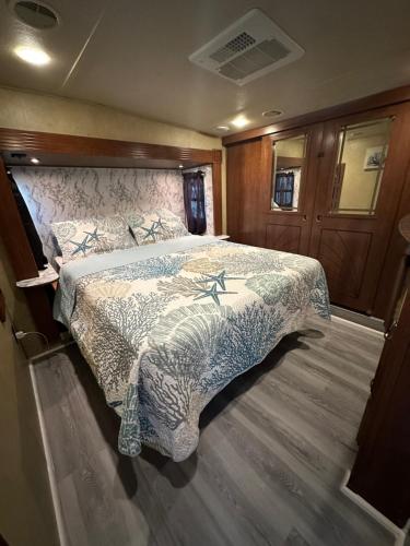 a bedroom with a bed on a boat at Green world zone in Calusa in Key Largo