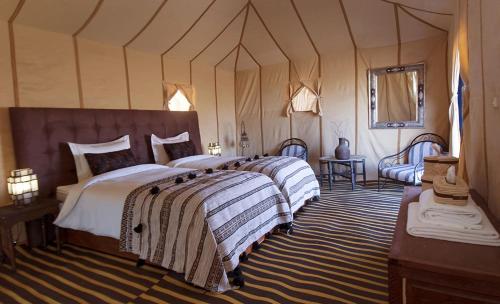 Ένα ή περισσότερα κρεβάτια σε δωμάτιο στο Camp Under Stars