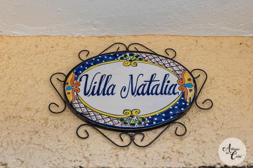 a sign on the side of a building at Antigua de Cabo in Cabo San Lucas