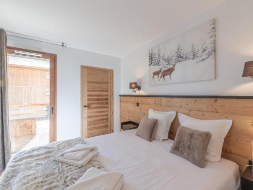 Postel nebo postele na pokoji v ubytování Appartement moderne au Vieil Alpe avec parking et terrasse - FR-1-645-65