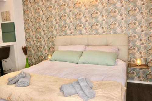 Postel nebo postele na pokoji v ubytování Philux City Apartment
