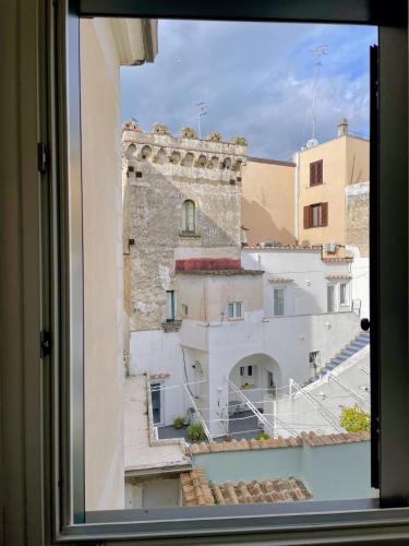 a view of a building from a window at Putechella's Apartments in Maiori