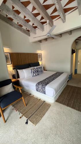 Ένα ή περισσότερα κρεβάτια σε δωμάτιο στο Hotel El Ciruelo, Tepoztlán