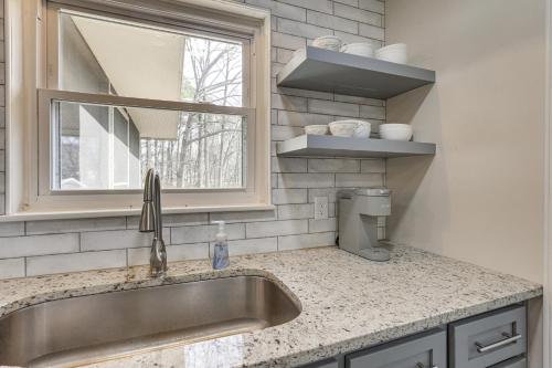 a kitchen with a sink and a window at Pet-Friendly Fultondale Home about 9 Mi to Birmingham! in Fultondale
