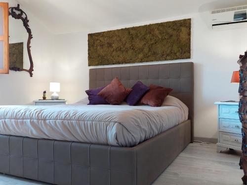 Postel nebo postele na pokoji v ubytování Sopra le nuvole
