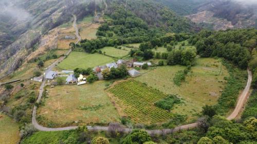 an aerial view of a farm on a mountain at O Busto Aldea Rural 