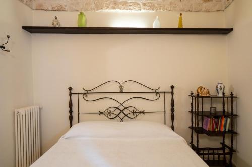 Een bed of bedden in een kamer bij CASA RITELLA