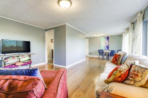 a living room with two couches and a flat screen tv at Pet-Friendly Union Home about 19 Mi to Cincinnati! in Union
