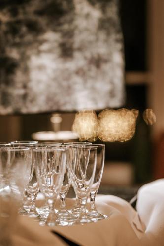a group of wine glasses sitting on a table at Château de Looz in Borgloon